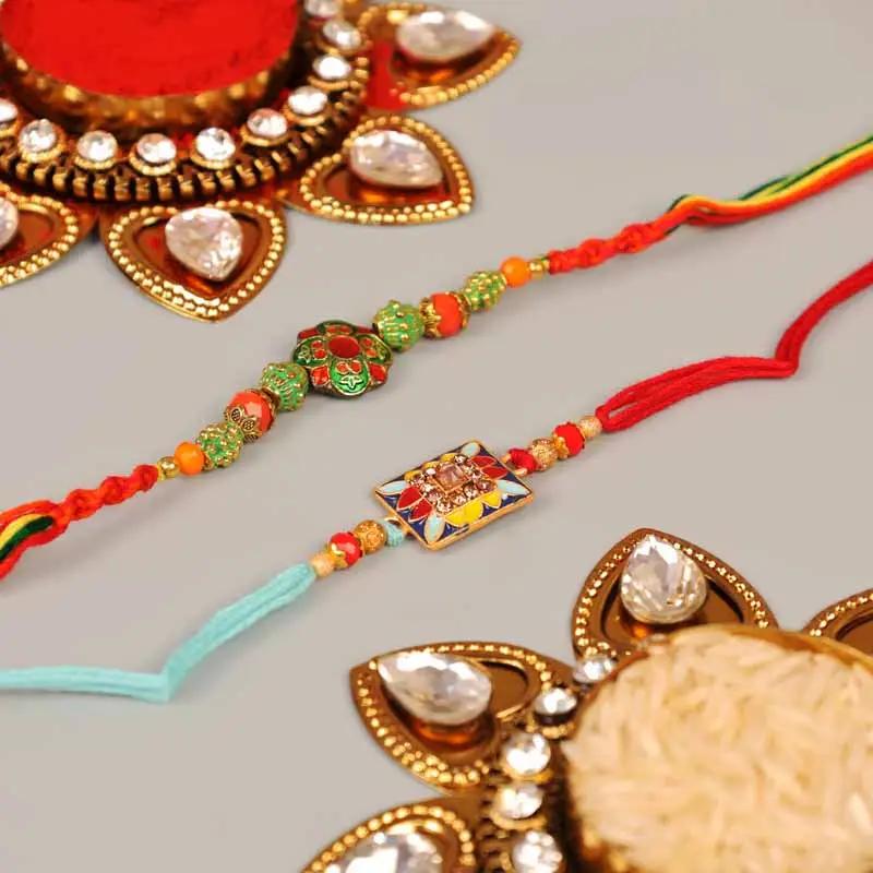 Antique and Kundan Rakhi Set of 2