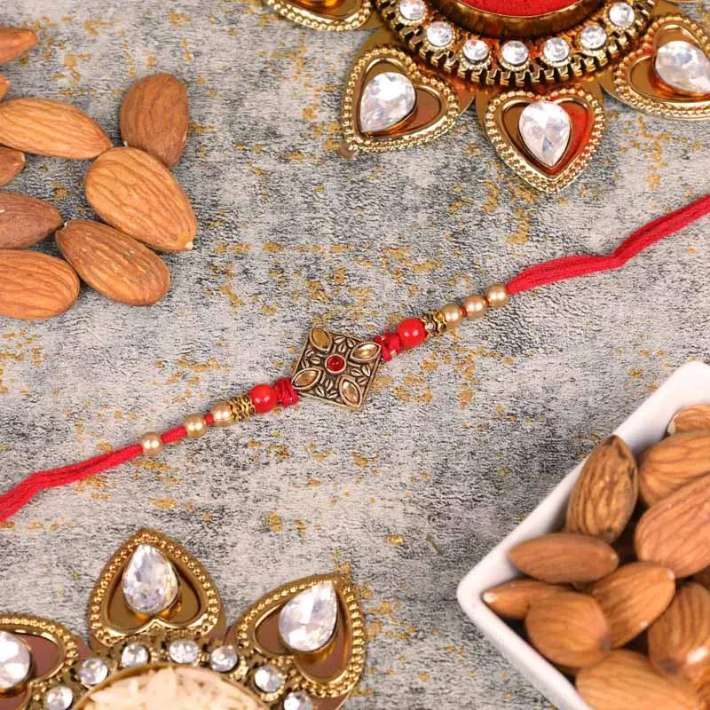 Antique Kundan Rakhi and Almonds