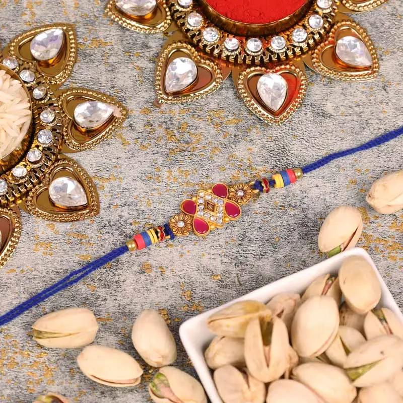Designer Kundan Rakhi and Pistachio