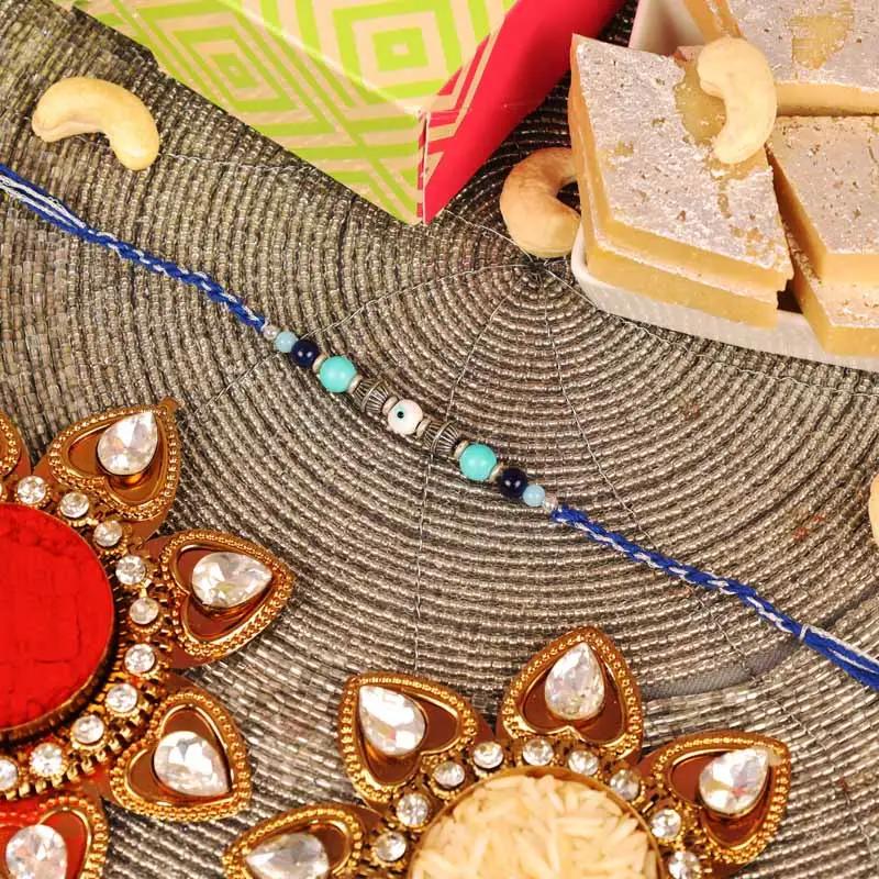 Evil Eye Rakhi and Kaju Katli